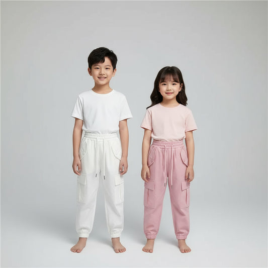 White pants with a button being held, pink pants in the background, Massala brand visible