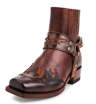 Brown leather boot with decorative straps on a white background