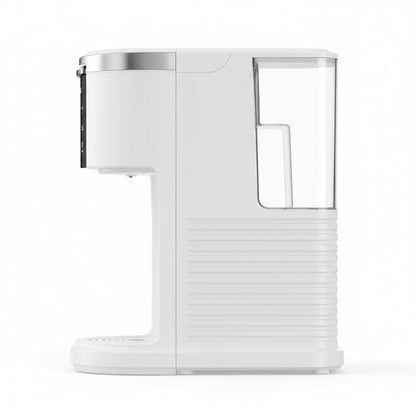 White coffee machine with an orange mug, surrounded by K-cups and coffee grounds on a white background